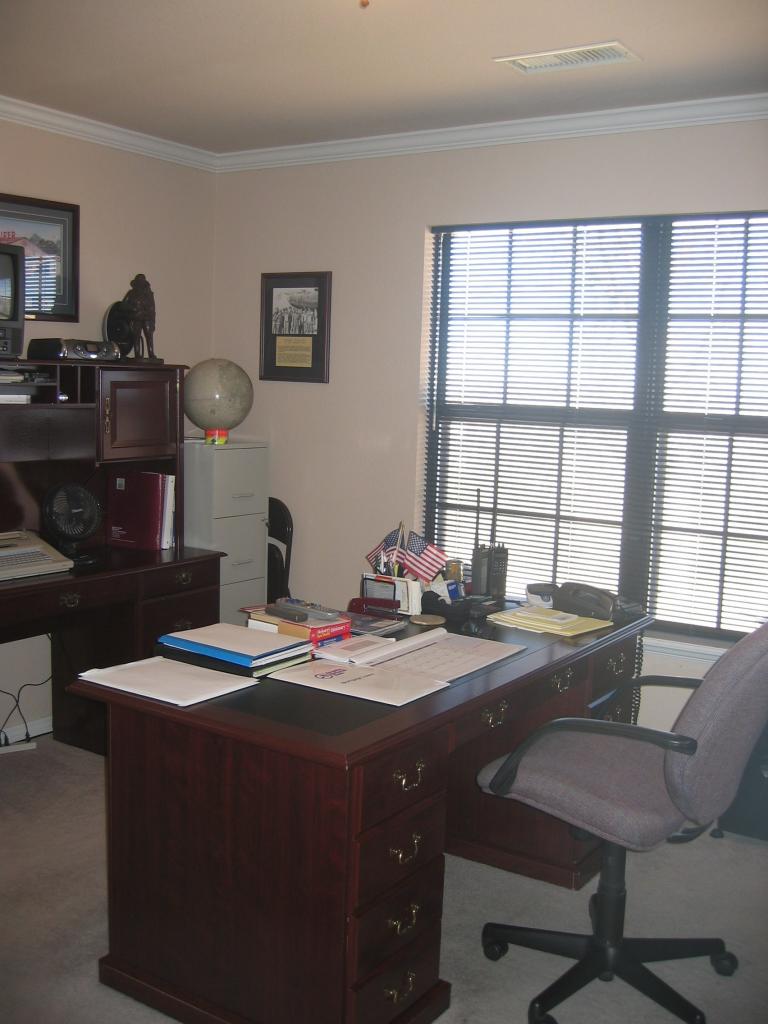 711 McKenzie Road Amarillo, TX 79118 - Photo 20 of 38 a dining room with a table chairs and a wooden floor