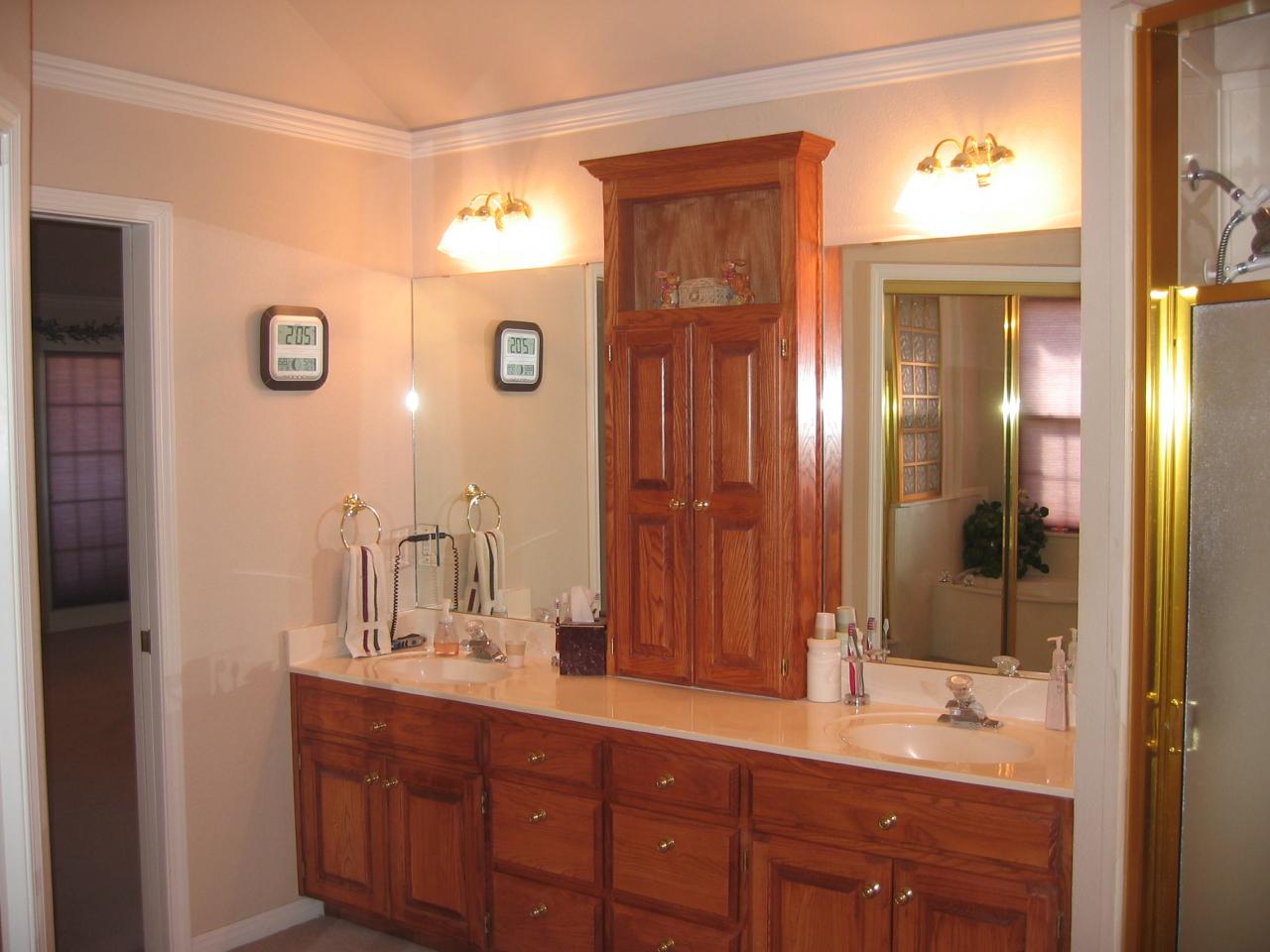 711 McKenzie Road Amarillo, TX 79118 - Photo 10 of 38 a bathroom with a double vanity sink and a mirror
