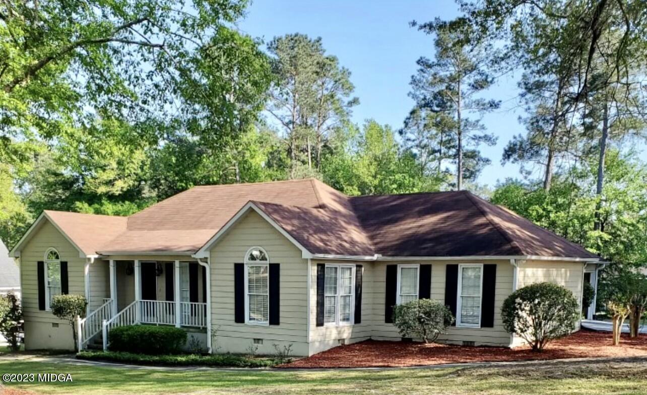 310 Old Oak Road Macon, GA 31216 - Photo 1 of 27 a view of a house with a garden