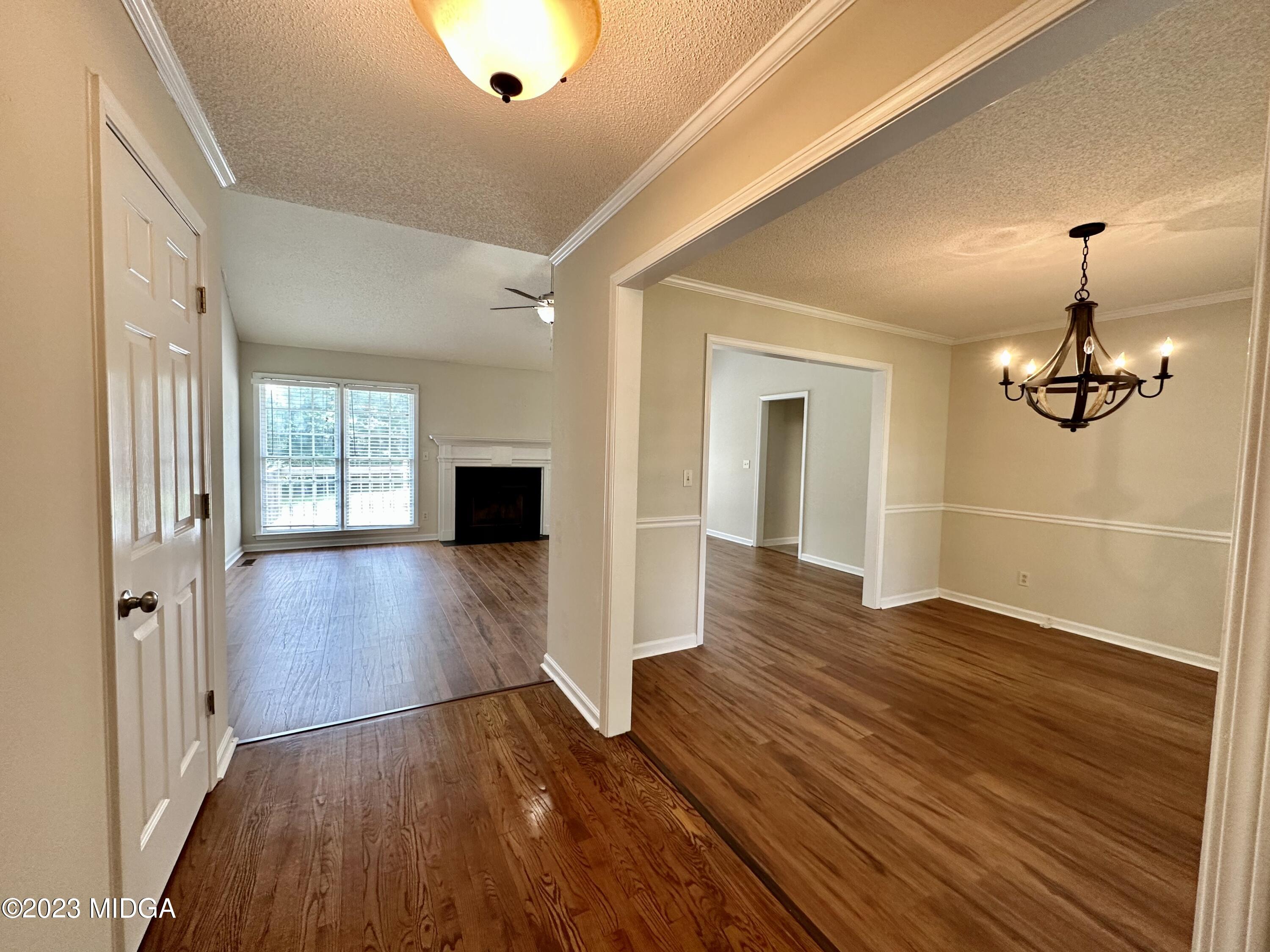310 Old Oak Road Macon, GA 31216 - Photo 2 of 27 wooden floor in an empty room with a window