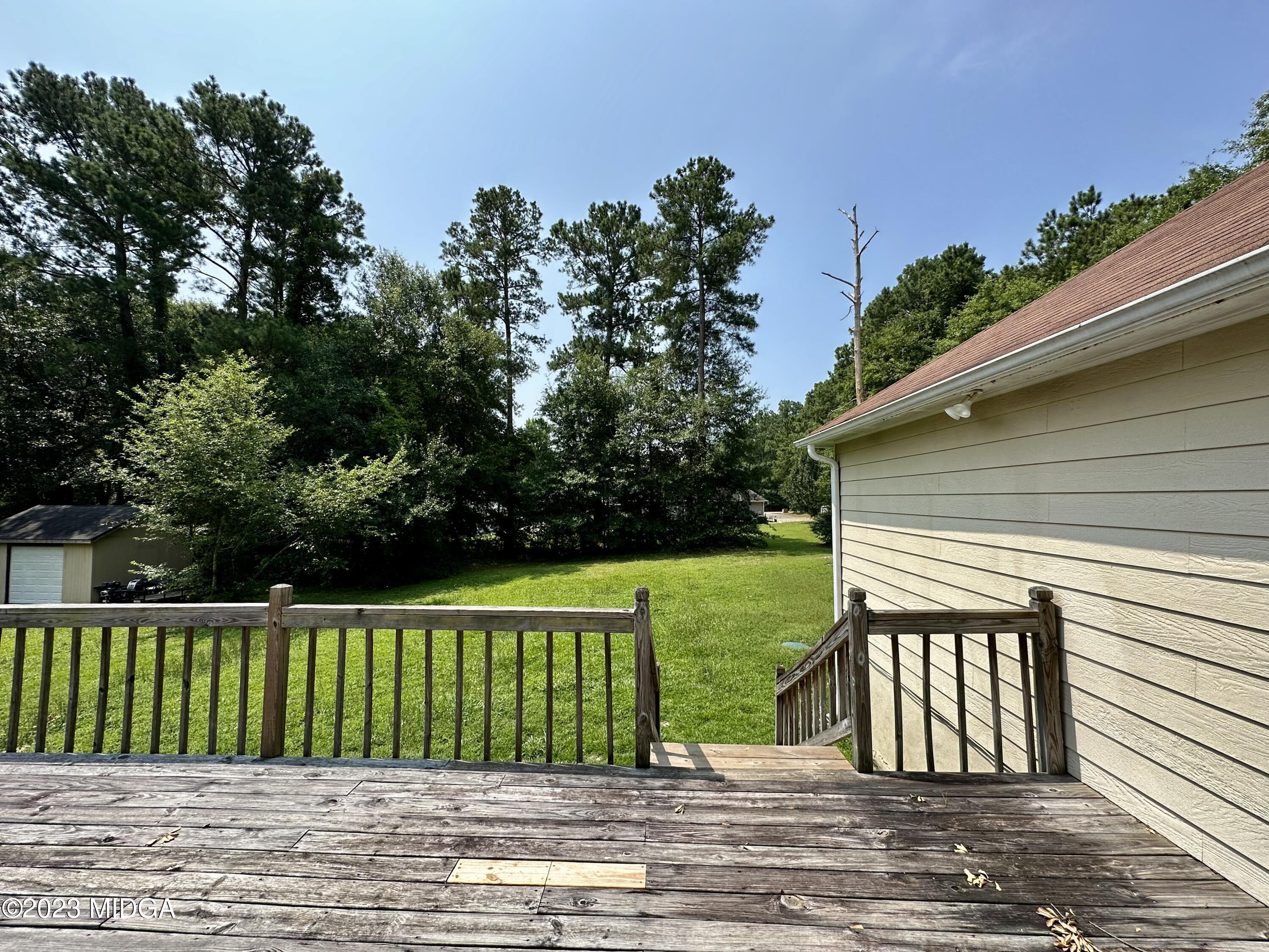 310 Old Oak Road Macon, GA 31216 - Photo 21 of 27 a view of a wooden deck