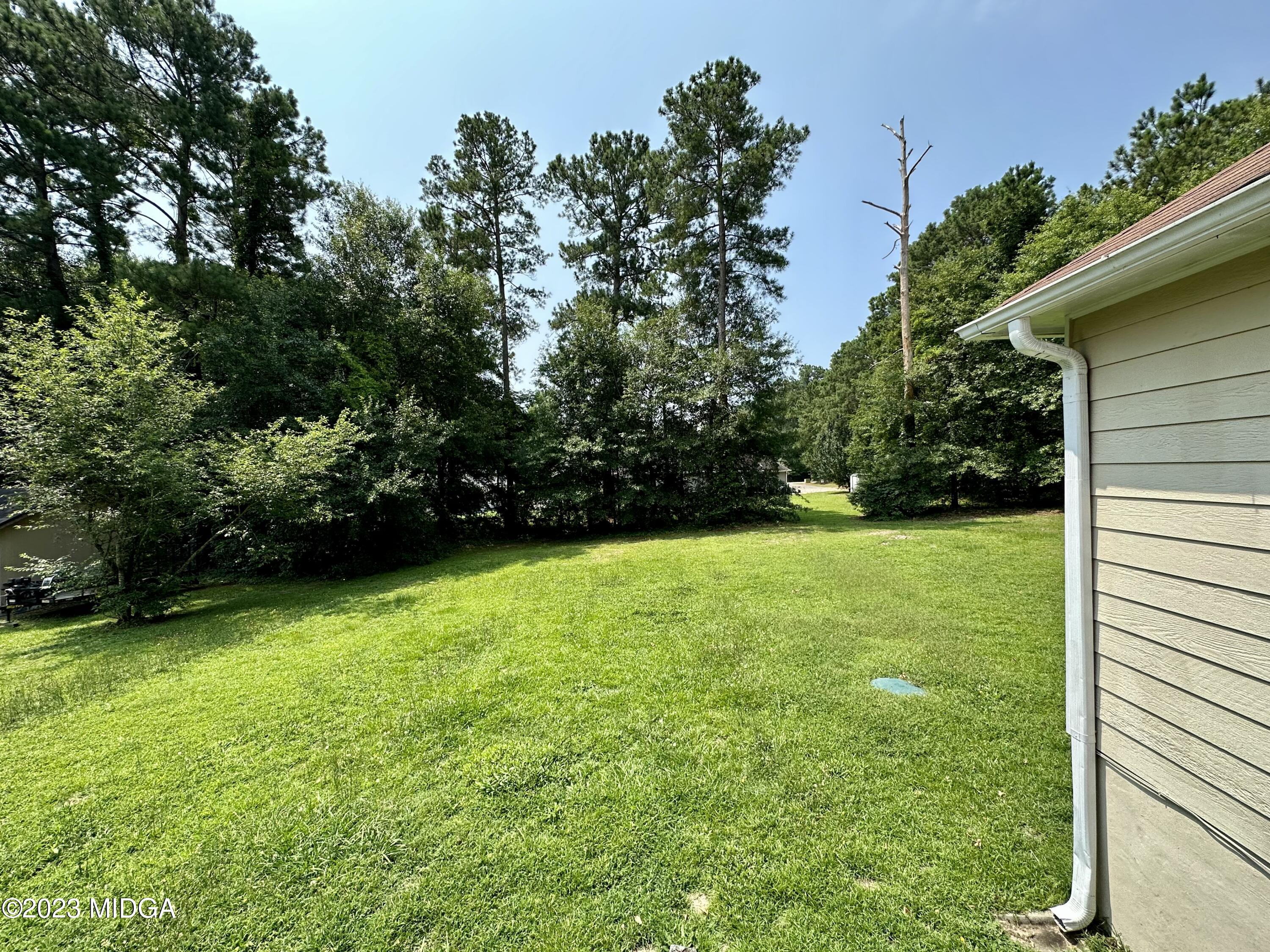 310 Old Oak Road Macon, GA 31216 - Photo 22 of 27 a view of outdoor space and yard