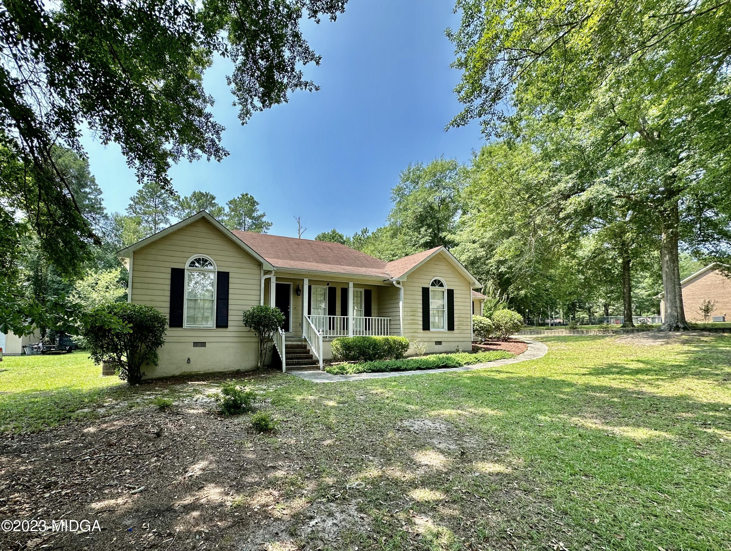 310 Old Oak Road Macon, GA 31216 - Photo 25 of 27 a front view of house with yard and green space