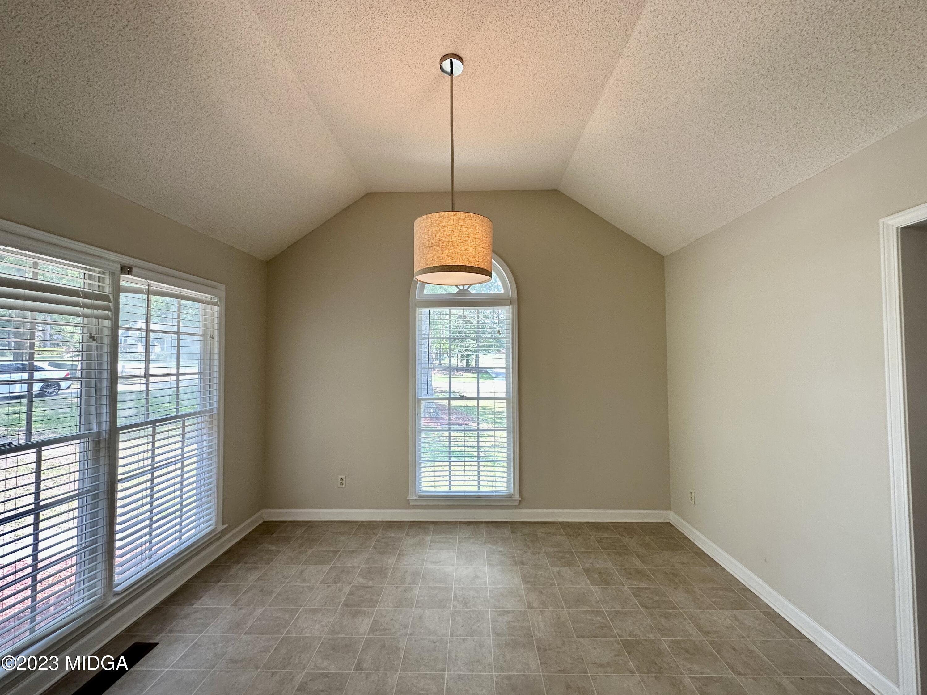 310 Old Oak Road Macon, GA 31216 - Photo 9 of 27 a view of a room with windows