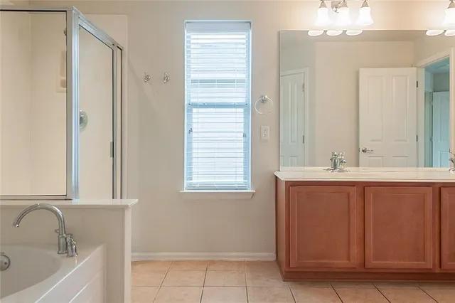 a bathroom with a double vanity sink mirror and double