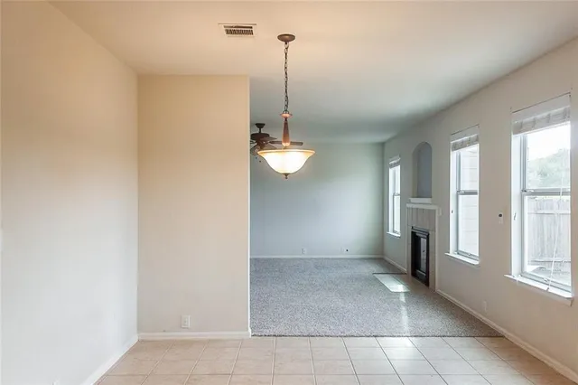 a view of an empty room with window