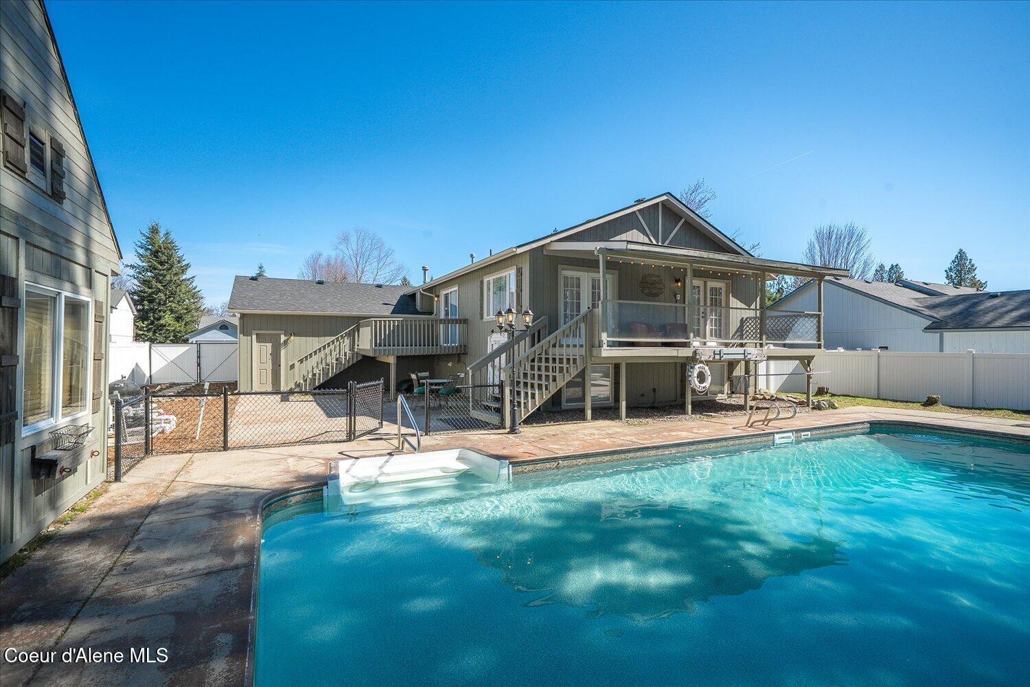 2531 Titleist Way Post Falls, ID 83854 - Photo 38 of 61 Pool & Back of Home