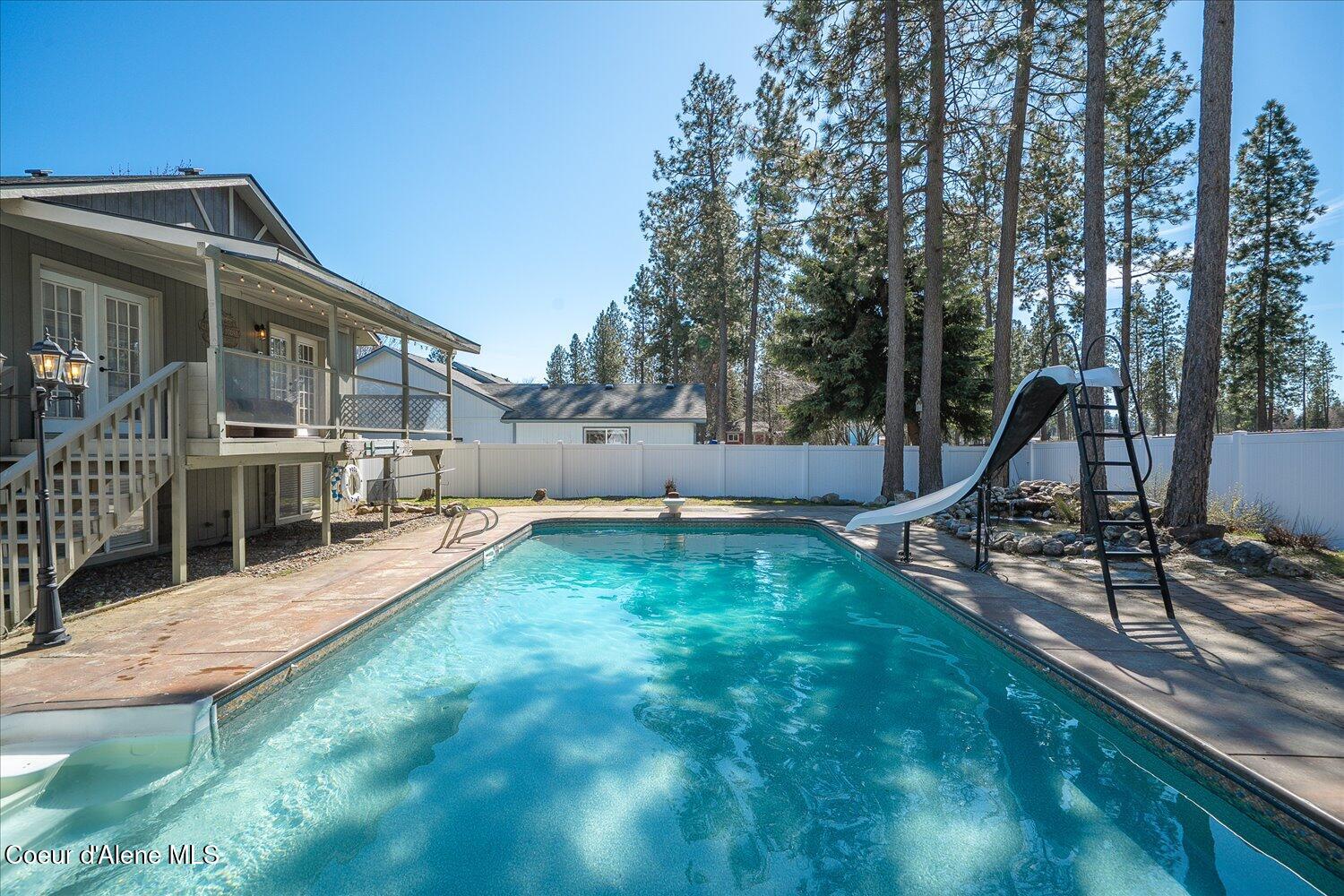 2531 Titleist Way Post Falls, ID 83854 - Photo 39 of 61 Pool & Back of Home