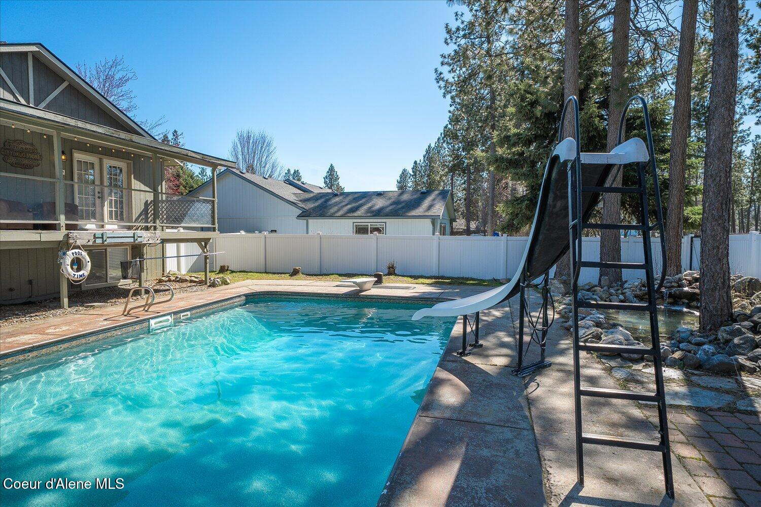2531 Titleist Way Post Falls, ID 83854 - Photo 44 of 61 Pool & Back of Home