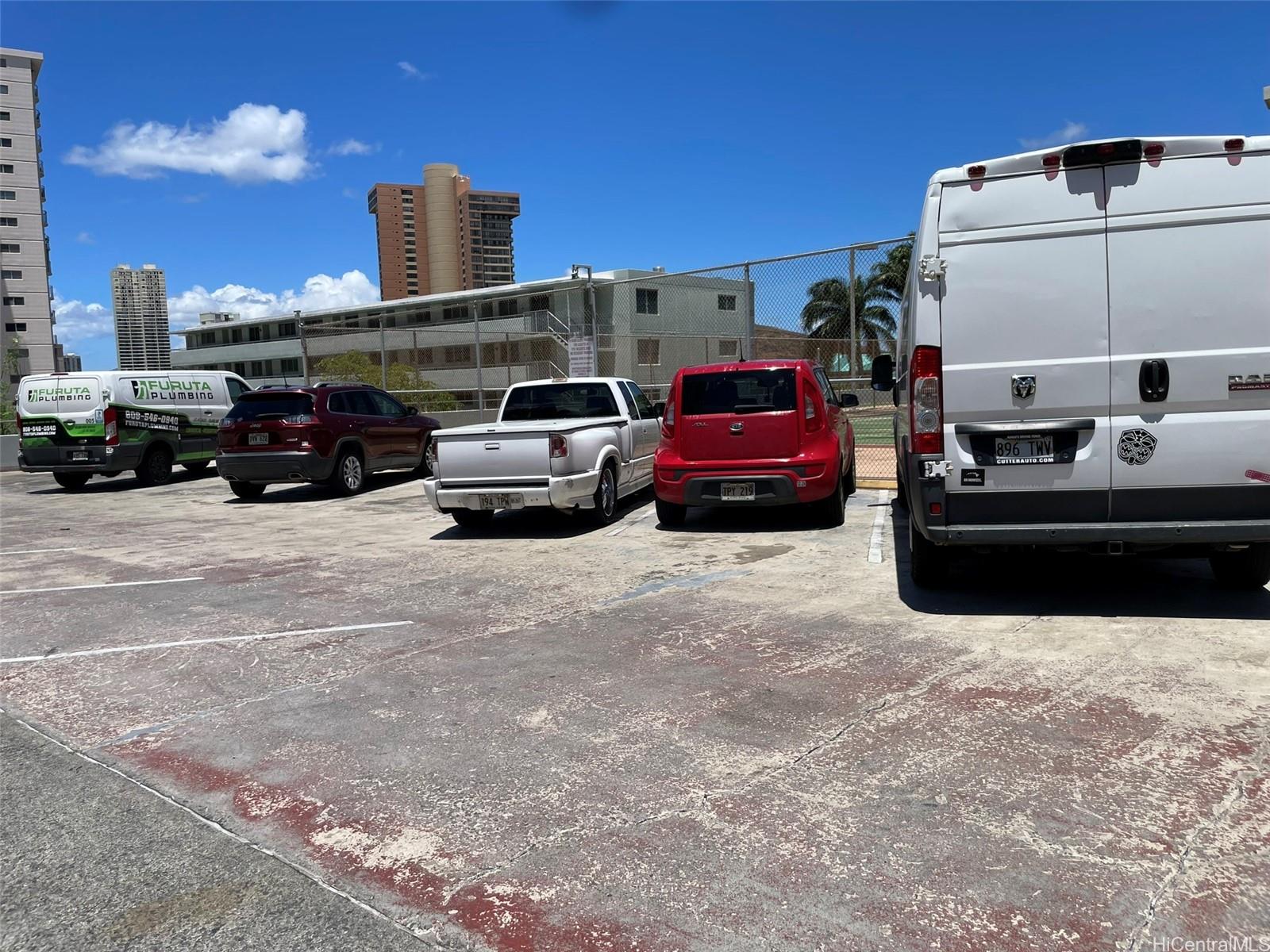 2888 Ala Ilima Street, Unit 910 Honolulu, HI 96818 - Photo 11 of 15 a car parked in a parking lot