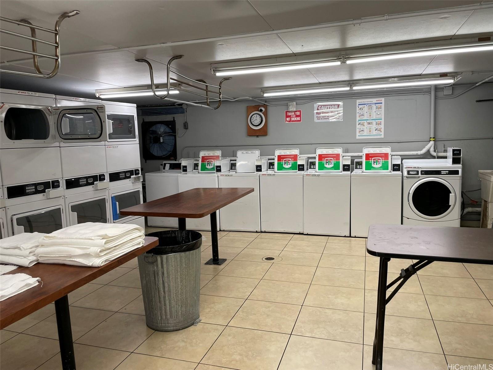 2888 Ala Ilima Street, Unit 910 Honolulu, HI 96818 - Photo 15 of 15 a kitchen with a table and chairs in it