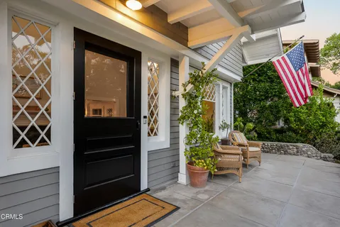 a backyard of a house with seating space