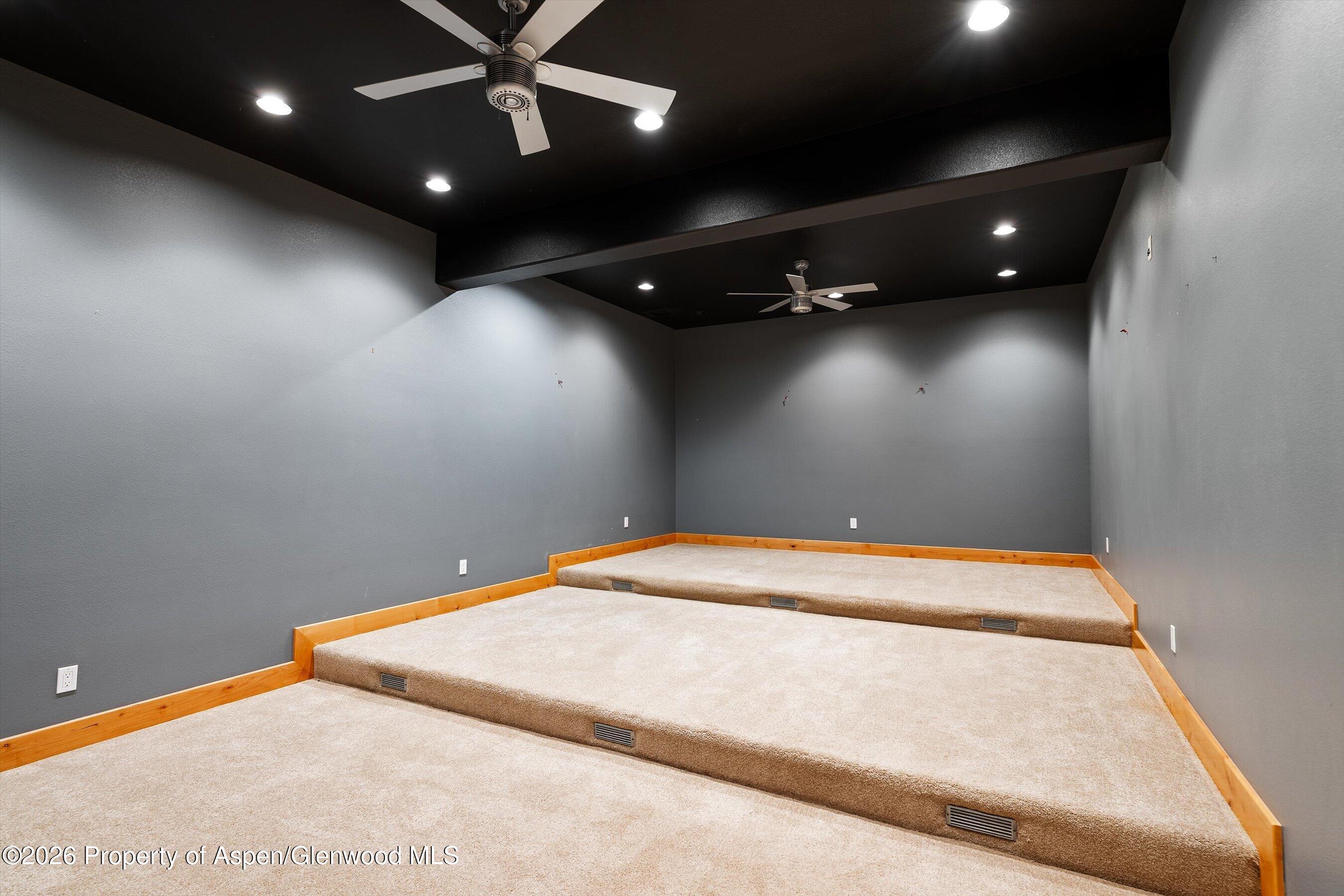 450 Summer Falls Road Silt, CO 81652 - Photo 30 of 50 a room with a ceiling fan and couch