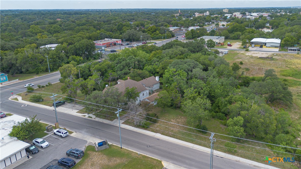 832 East Court Street Seguin, TX 78155 - Photo 27 of 31 an aerial view of a house with a yard