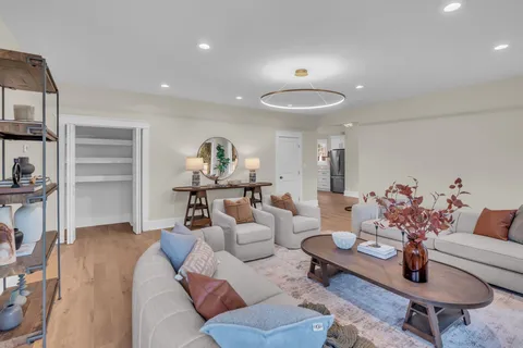 a bathroom with a sink and mirror with painted walls