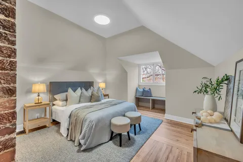 a room with wooden floor and table