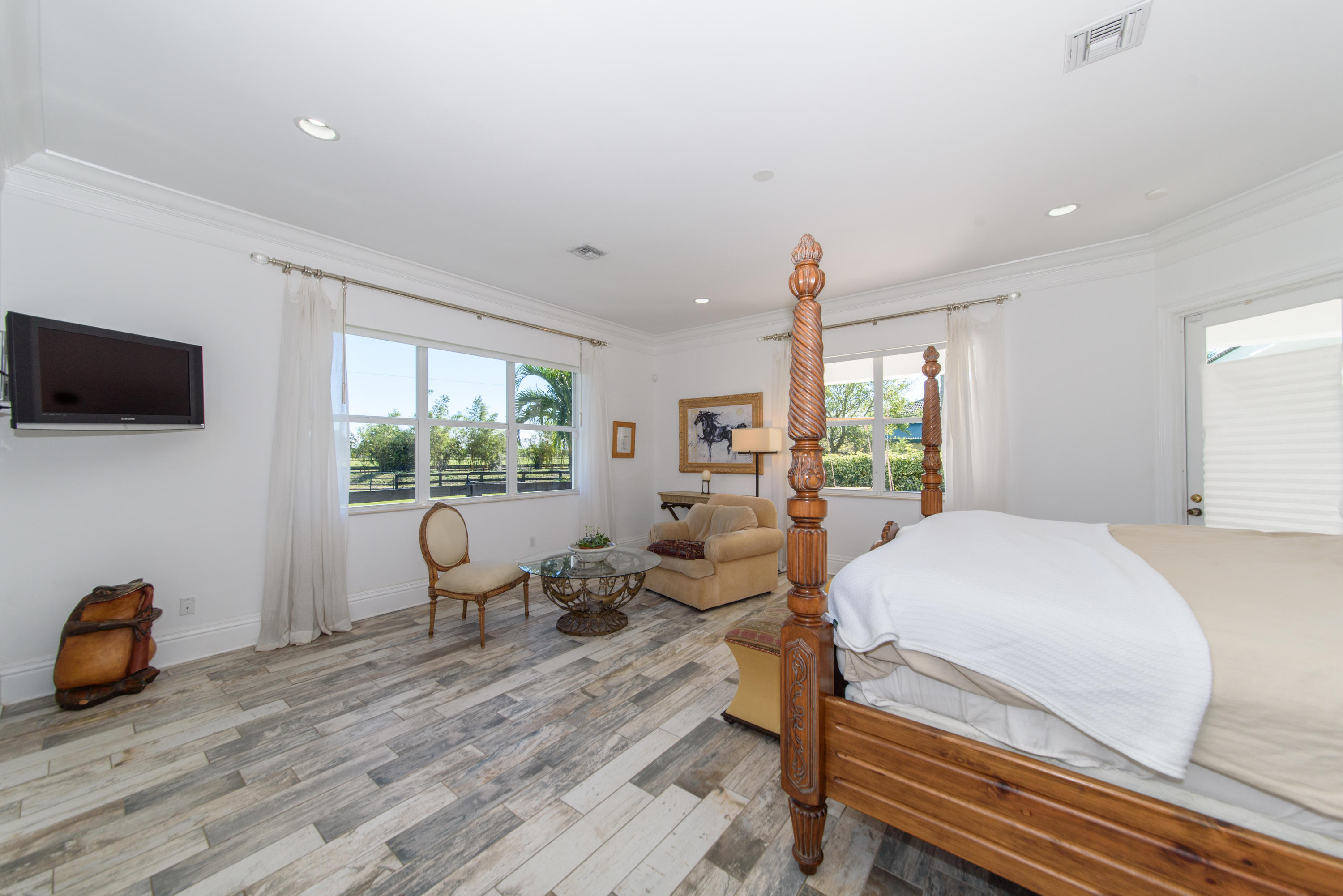 13200 Southfields Road Wellington, FL 33414 - Photo 17 of 39 Large master bedroom with cabana door