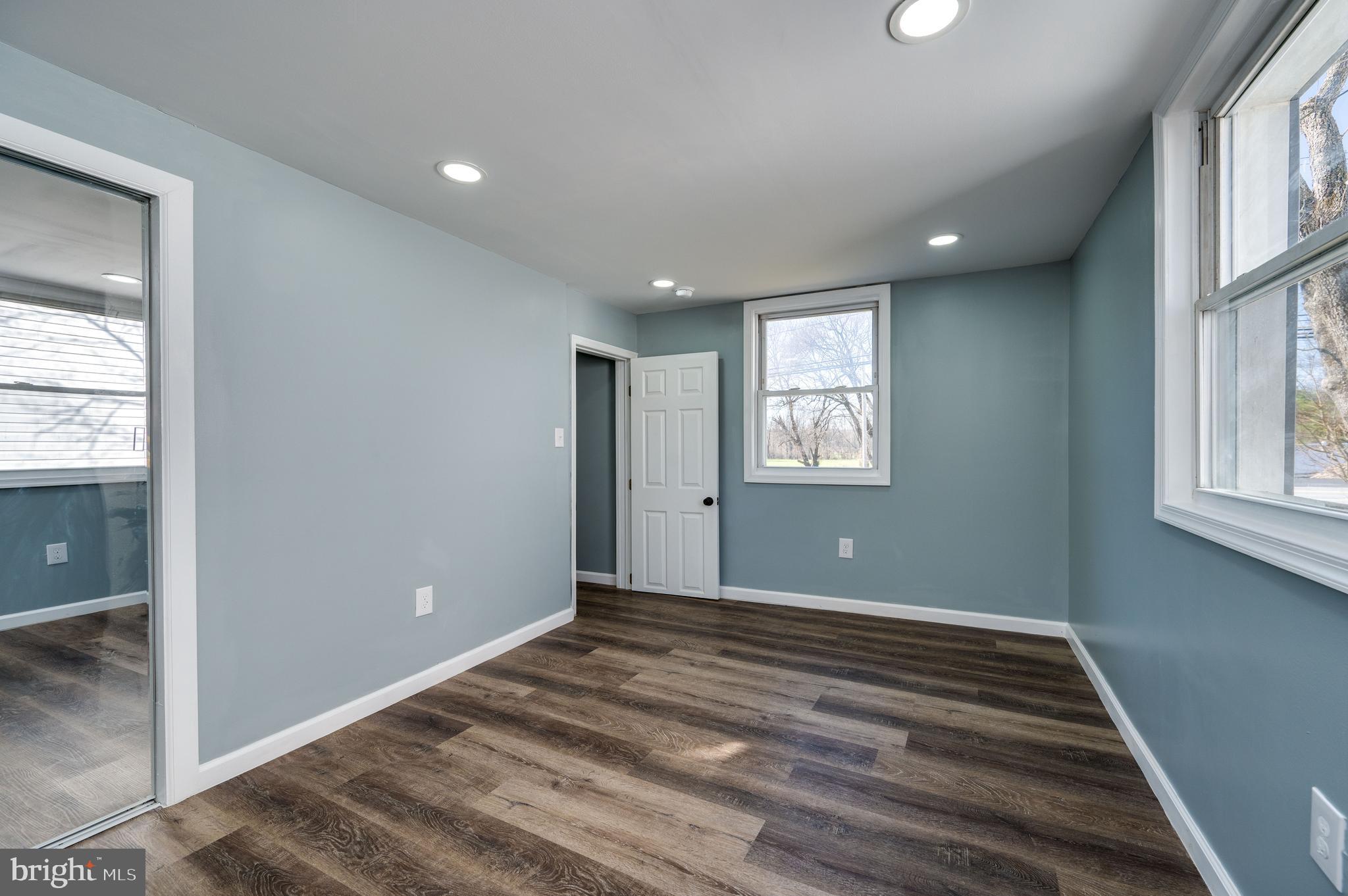3247 State Hill Road Reading, PA 19608 - Photo 15 of 40 a view of an empty room with wooden floor and a window