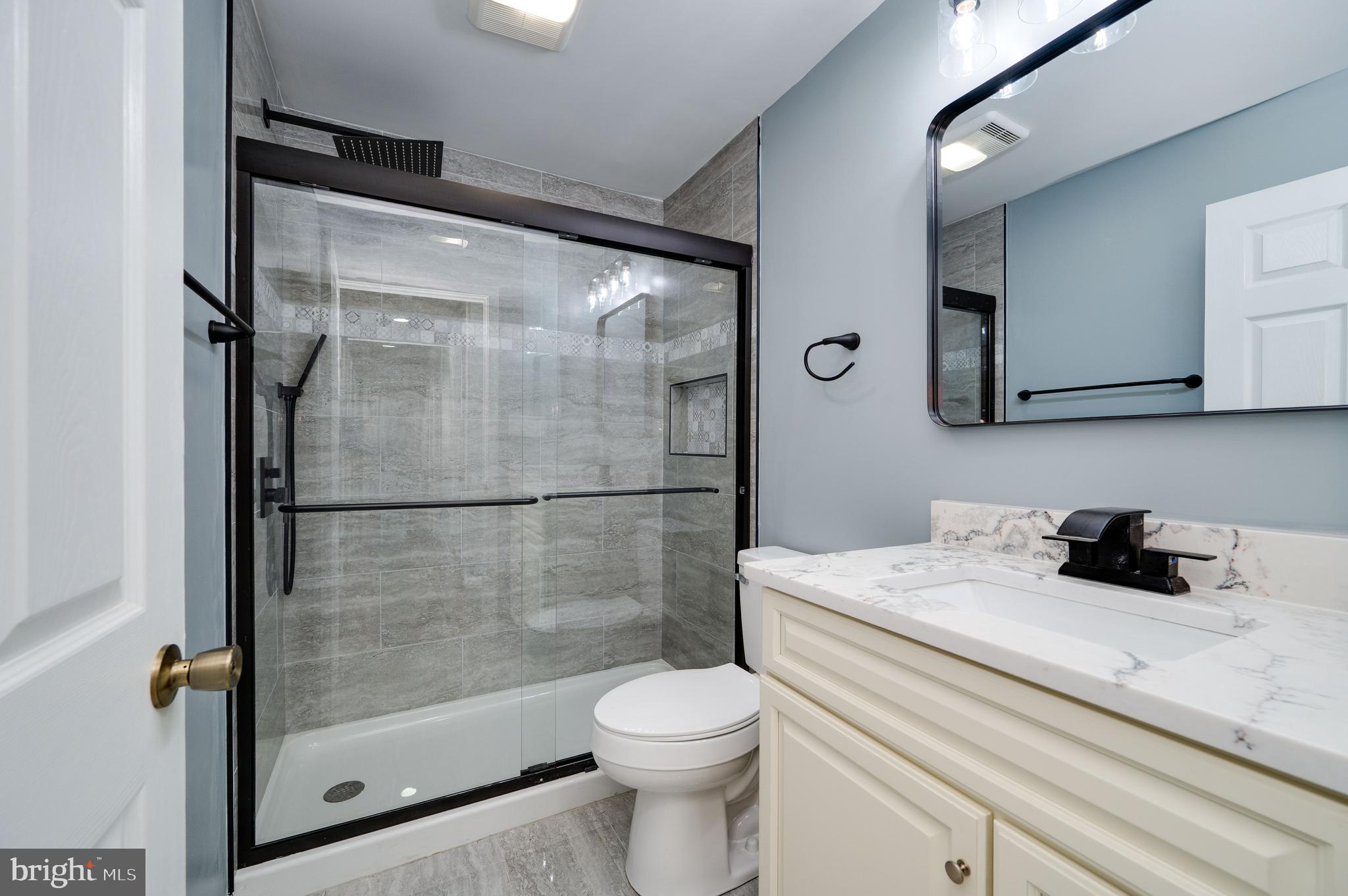 3247 State Hill Road Reading, PA 19608 - Photo 16 of 40 a bathroom with a sink toilet and shower