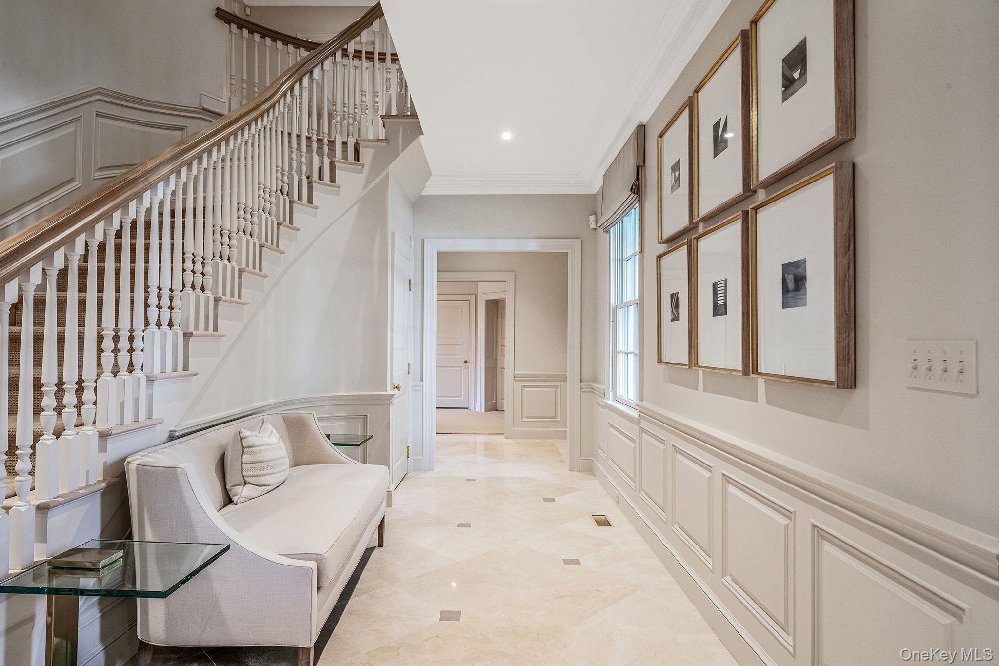 530 Chicken Valley Road Locust Valley, NY 11560 - Photo 21 of 50 Hall with a decorative wall, stairway
