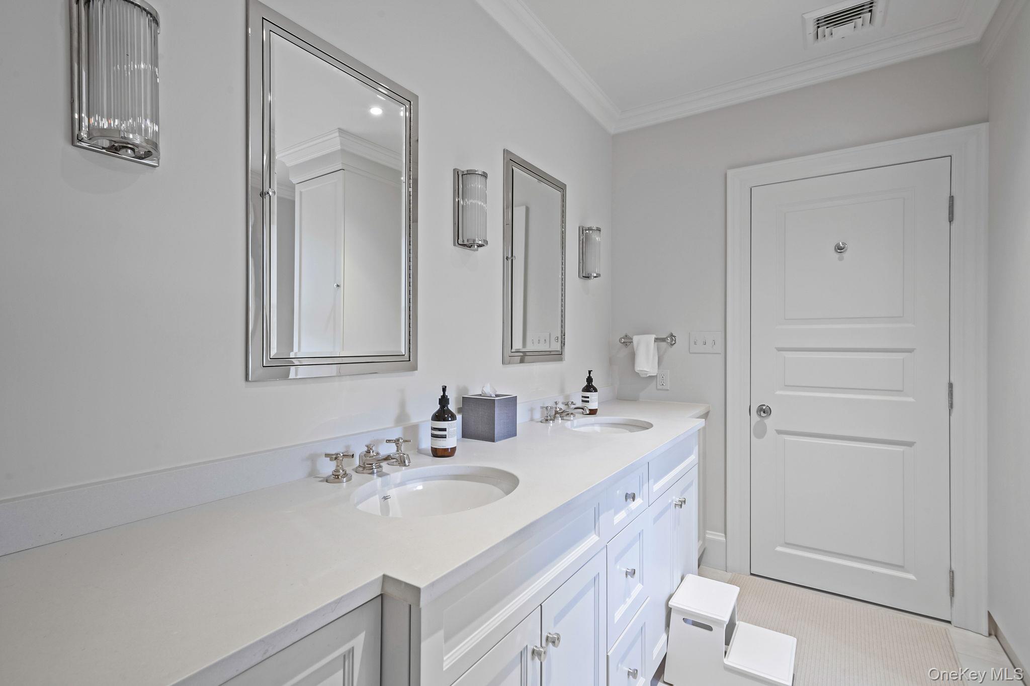 530 Chicken Valley Road Locust Valley, NY 11560 - Photo 34 of 50 Full bathroom featuring double vanity and crown molding