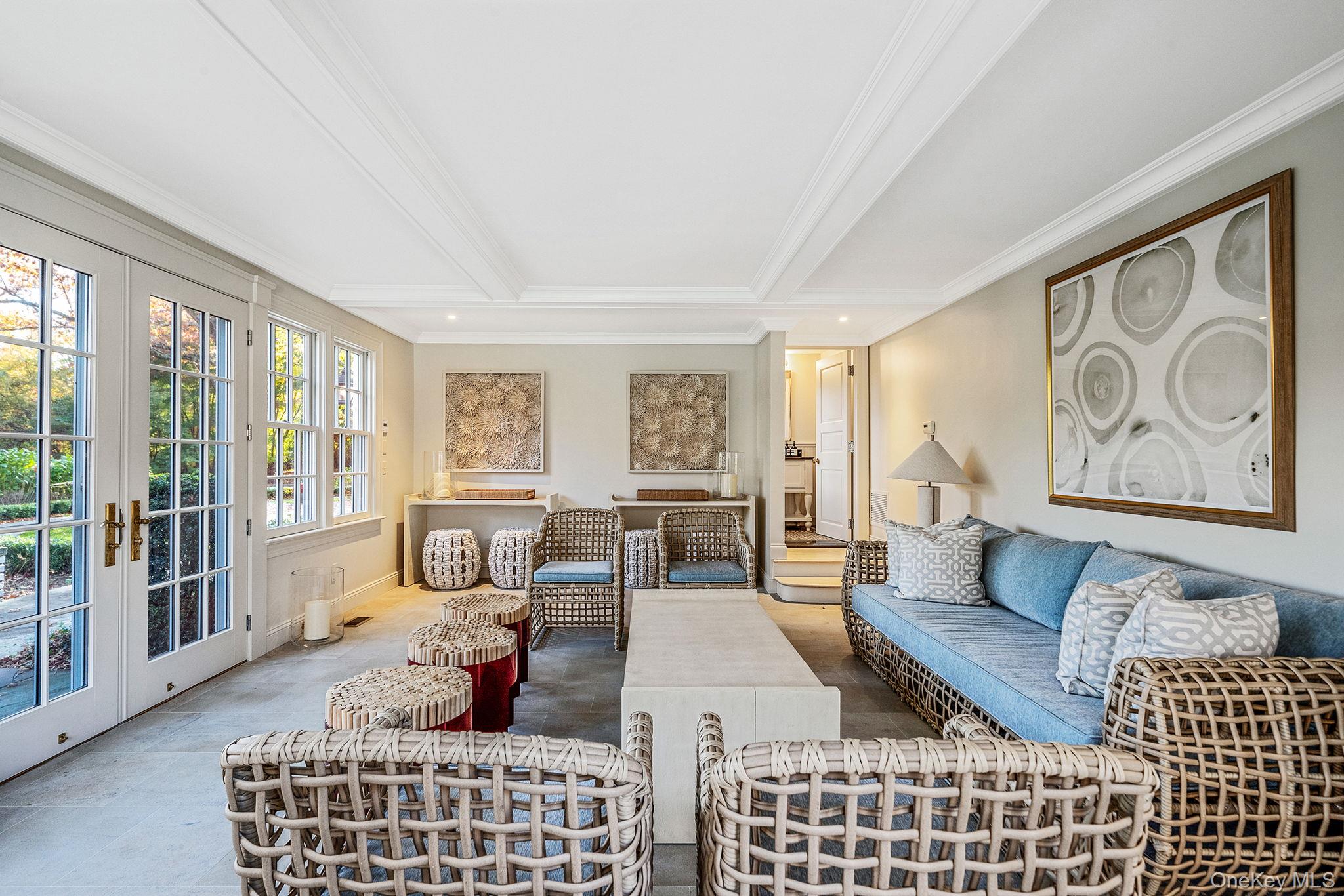 530 Chicken Valley Road Locust Valley, NY 11560 - Photo 47 of 50 Cabana, french doors, crown molding, and beam ceiling