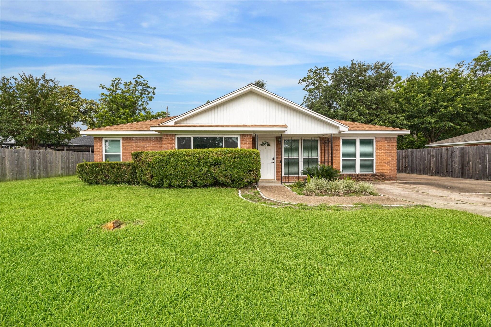 3613 Lazy Spring Drive Houston, TX 77080 - Photo 1 of 22 a view of a house with a yard and a garden