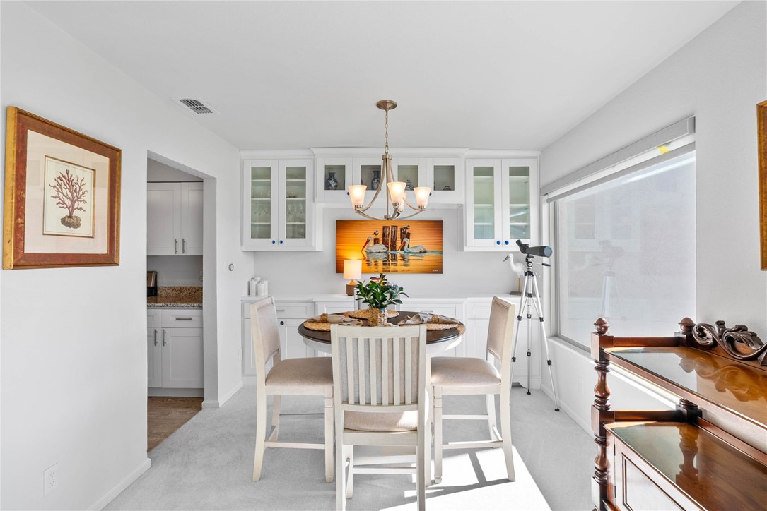 620 South Fulton Beach Road, Unit 611 Rockport, TX 78382 - Photo 7 of 15 a view of a dining room with furniture window and outside view