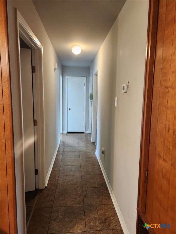 306 Dover Street Victoria, TX 77905 - Photo 14 of 20 a view of hallway with wooden floor
