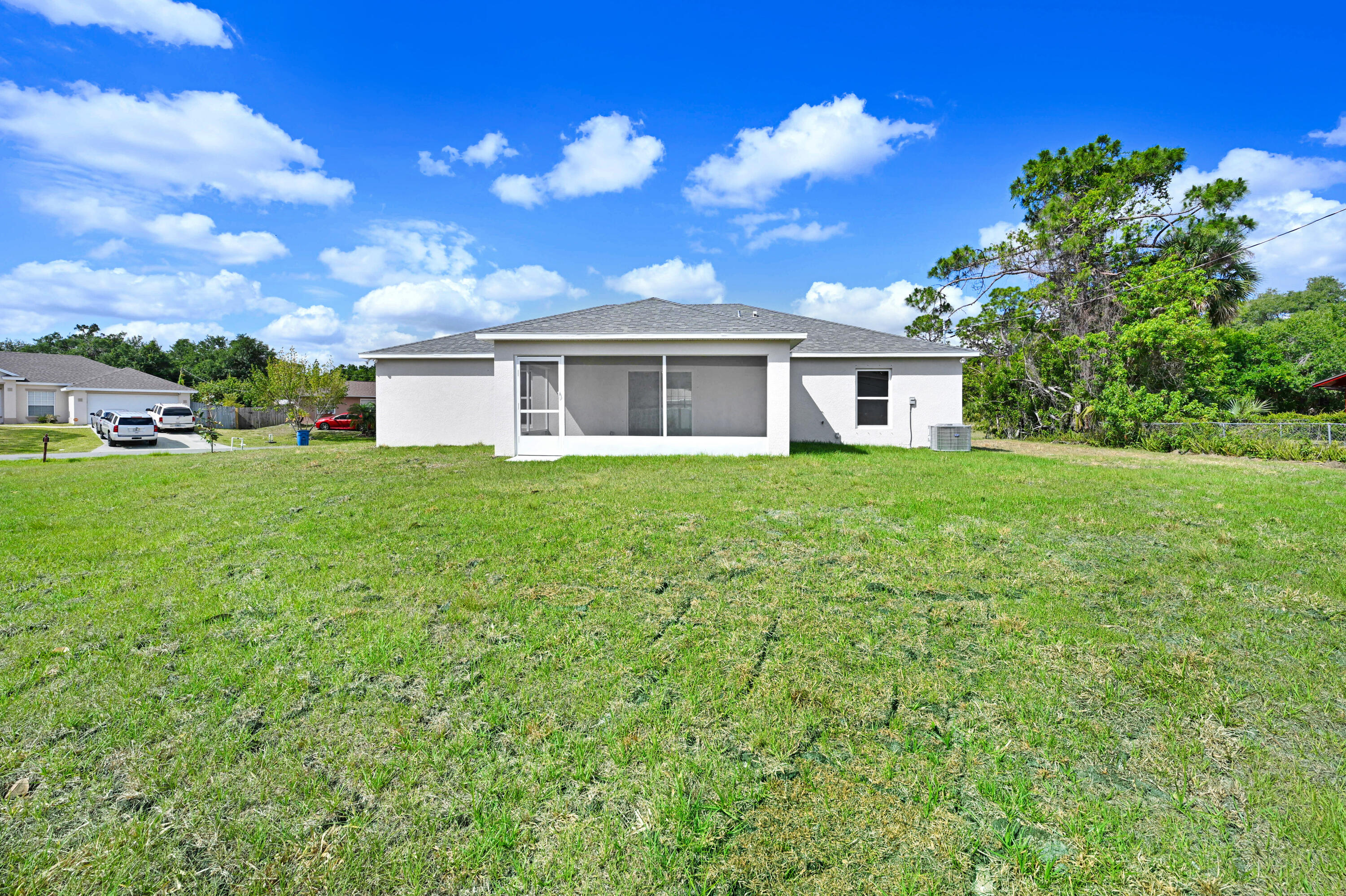 239 Trilby Road Southwest Palm Bay, FL 32908 - Photo 35 of 38 a house view with a garden space