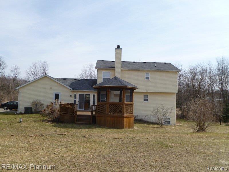 761 Argentine Road Howell, MI 48843 - Photo 2 of 21 REAR