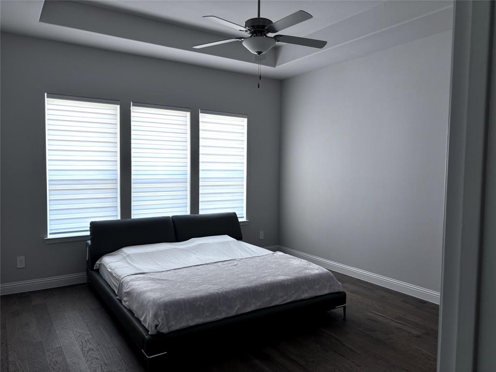 13391 Empire Maker Road Frisco, TX 75035 - Photo 8 of 12 a bedroom with a bed and a window