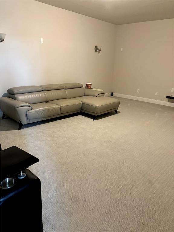 13391 Empire Maker Road Frisco, TX 75035 - Photo 10 of 12 a living room with furniture and a rug