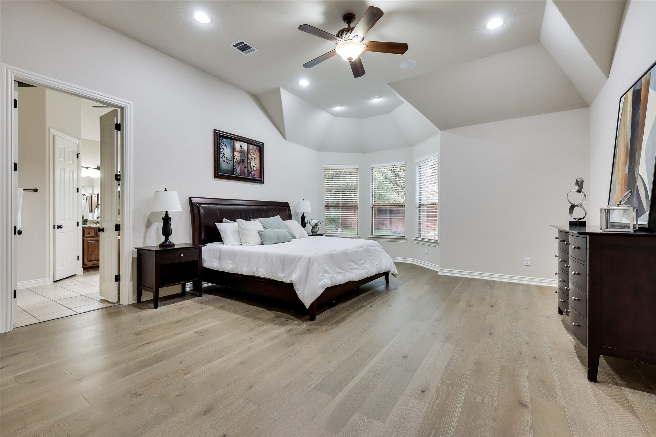 408 Ridgetop Bend Cedar Park, TX 78613 - Photo 22 of 40 Hardwood floors and a bay window create an inviting retreat.