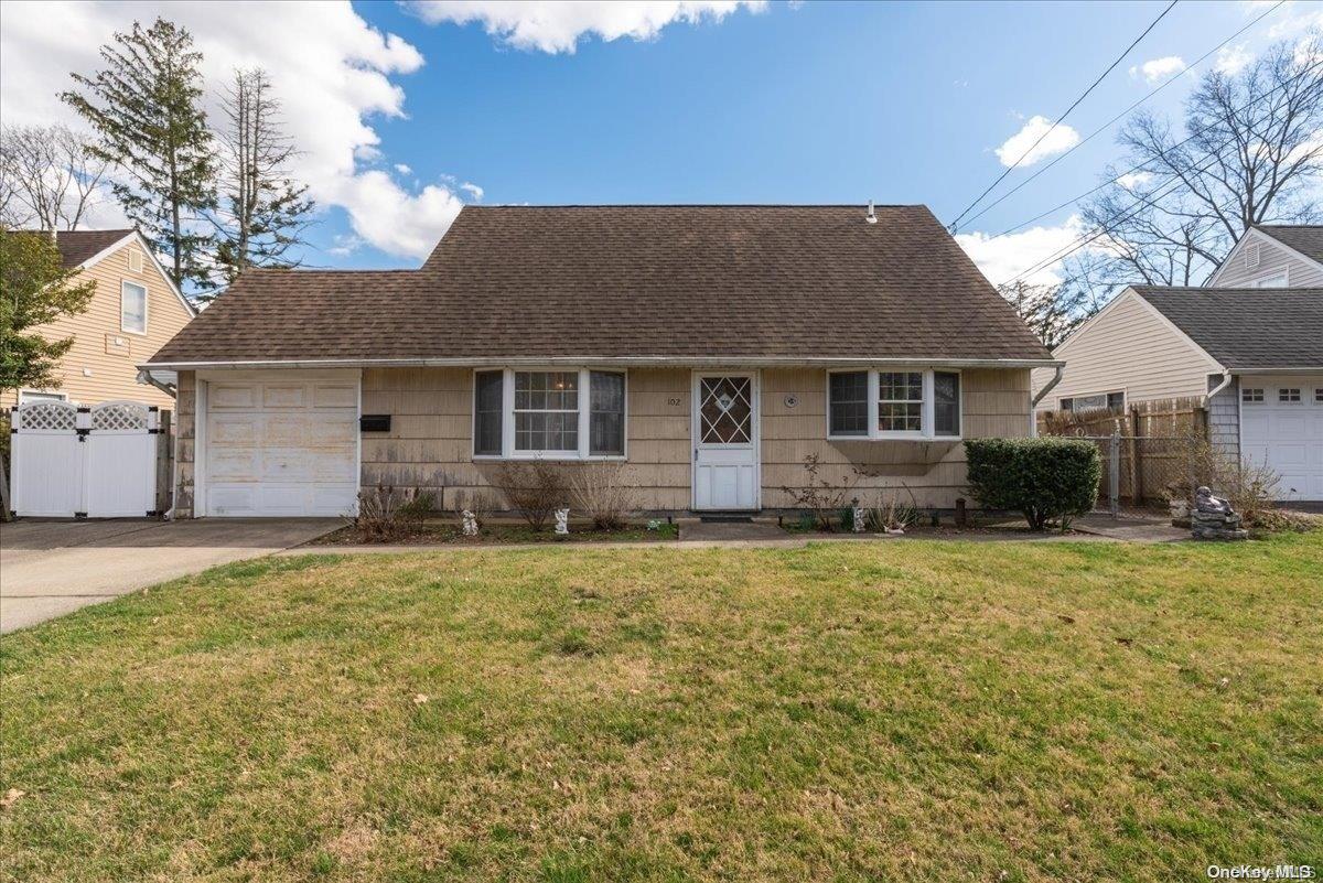102 Cold Spring Road Syosset, NY 11791 - Photo 1 of 1 a backyard of a house
