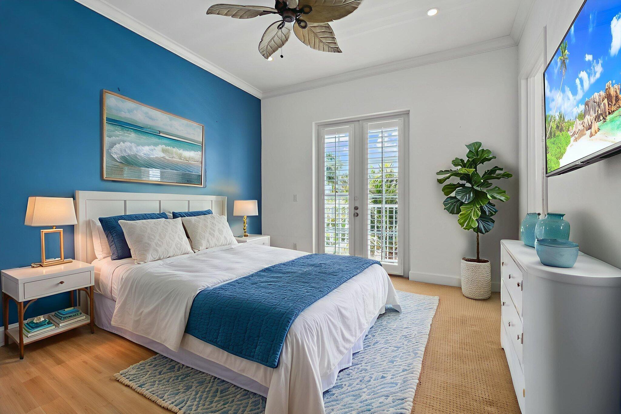 1579 Bow Line Road Fort Pierce, FL 34949 - Photo 21 of 56 a bedroom with bed and a potted plant