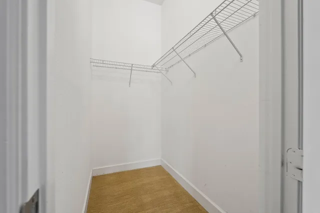 a view of a room with racks on the wall