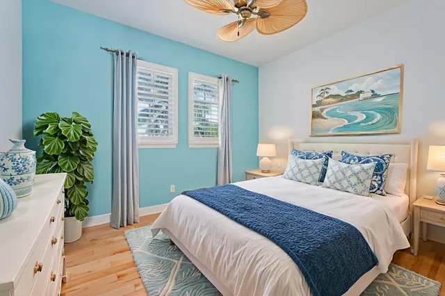 a view of an empty room with a ceiling fan