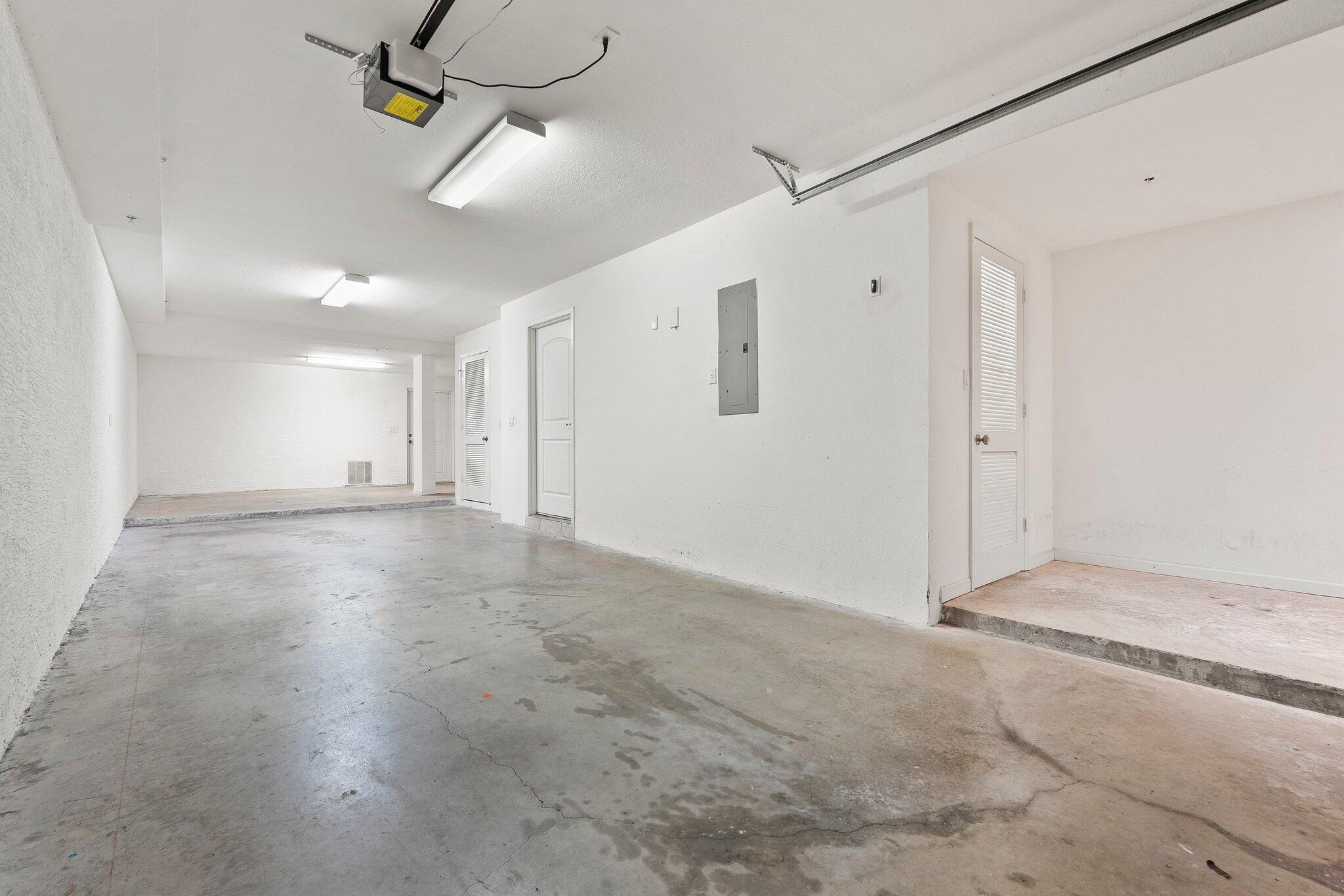 1579 Bow Line Road Fort Pierce, FL 34949 - Photo 38 of 56 a view of an empty room with a ceiling fan
