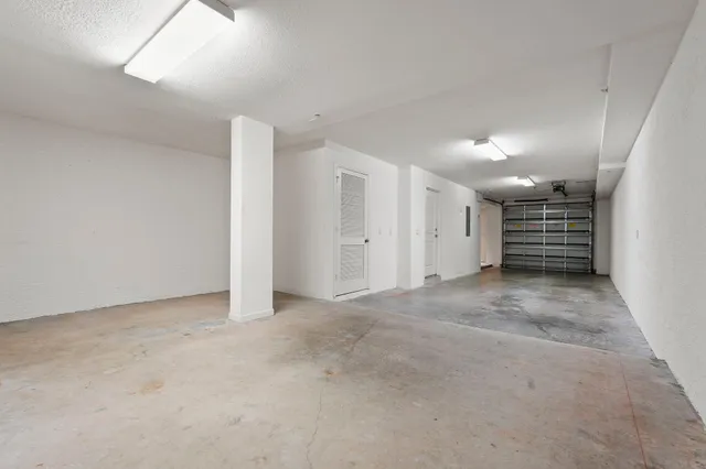 a front view of a building with garden