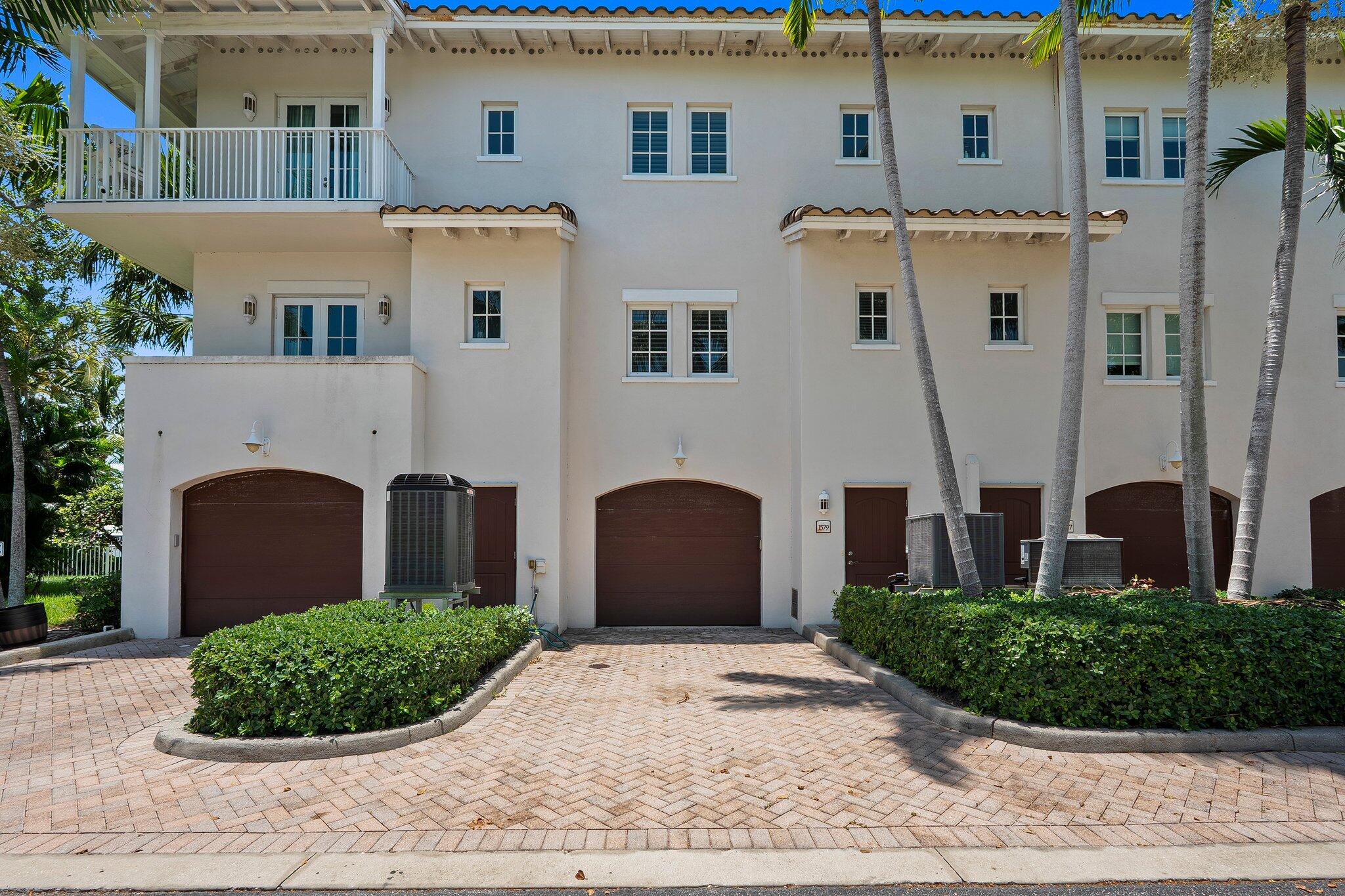 1579 Bow Line Road Fort Pierce, FL 34949 - Photo 42 of 56 a front view of a house with a garden