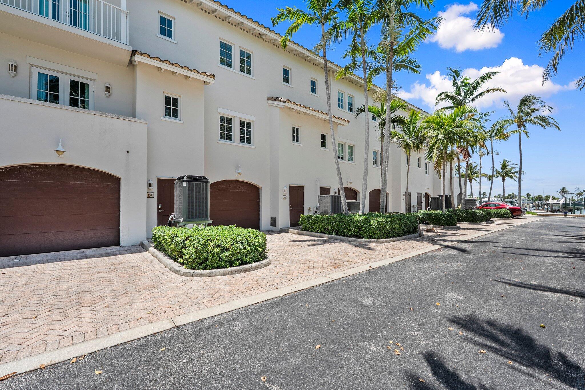 1579 Bow Line Road Fort Pierce, FL 34949 - Photo 43 of 56 a front view of a building with garden