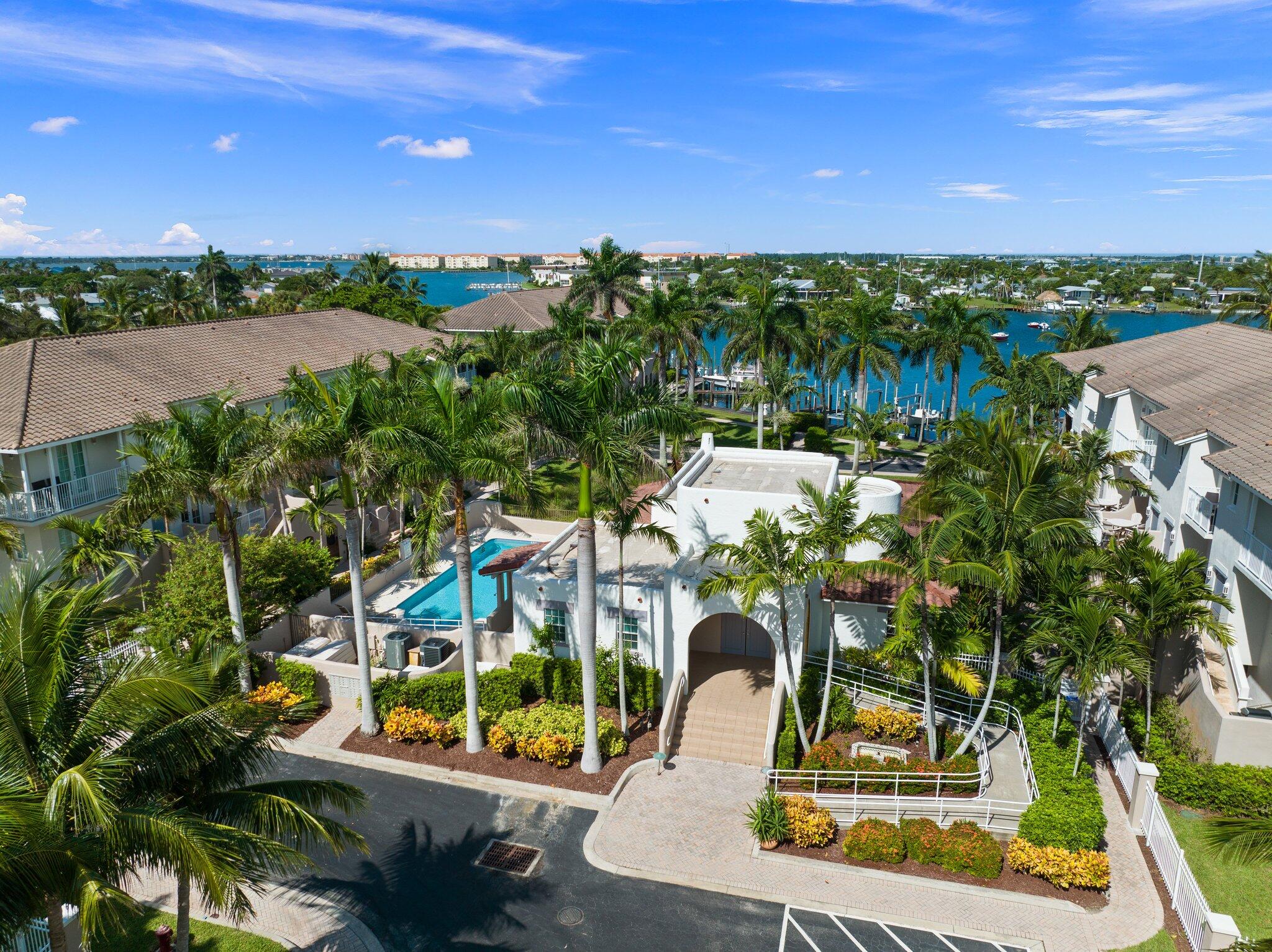 1579 Bow Line Road Fort Pierce, FL 34949 - Photo 54 of 56 a view of a swimming pool with a patio and a yard