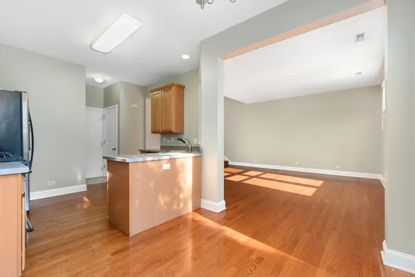 a view of a kitchen with a sink