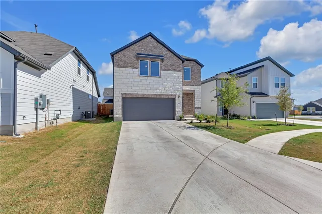 a front view of house with yard