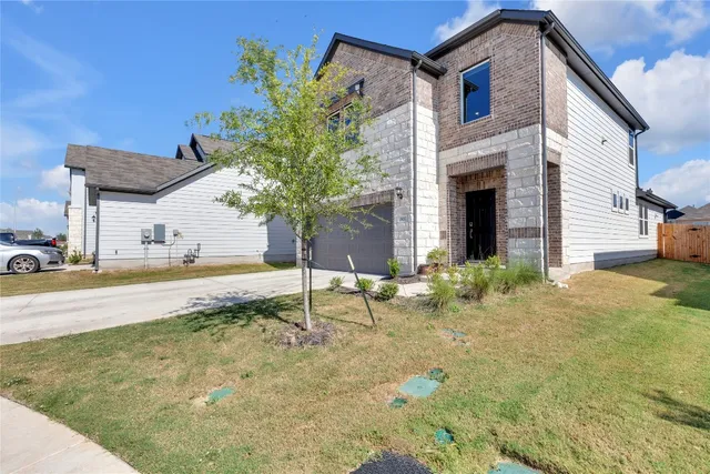 a house view with a outdoor space