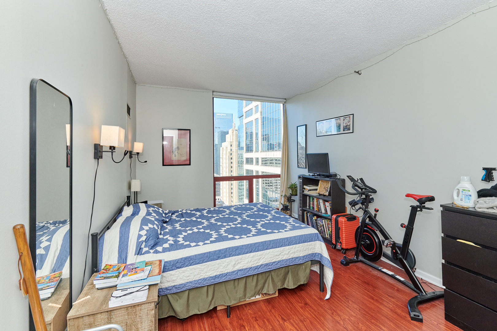 200 North Dearborn Street, Unit 4608 Chicago, IL 60601 - Photo 17 of 26 a bed room with a bed and a window