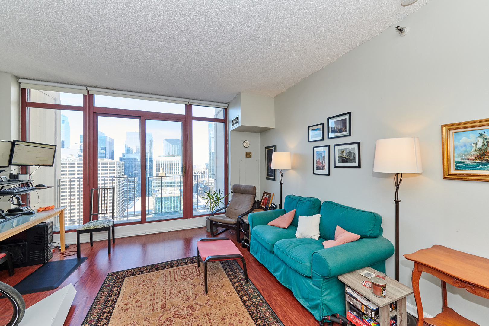 200 North Dearborn Street, Unit 4608 Chicago, IL 60601 - Photo 18 of 26 a living room with furniture and a rug