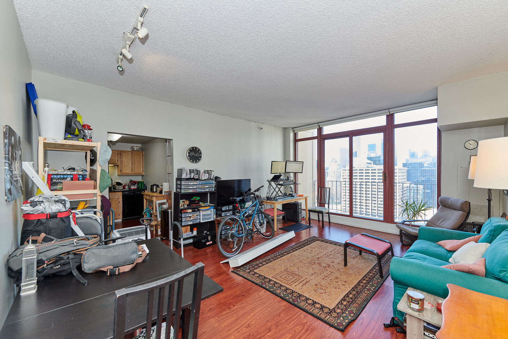 200 North Dearborn Street, Unit 4608 Chicago, IL 60601 - Photo 19 of 26 a living room with lots of furniture and a large window