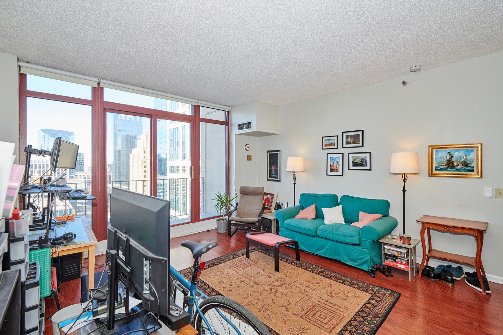 200 North Dearborn Street, Unit 4608 Chicago, IL 60601 - Photo 3 of 26 a living room with furniture a rug and a large window